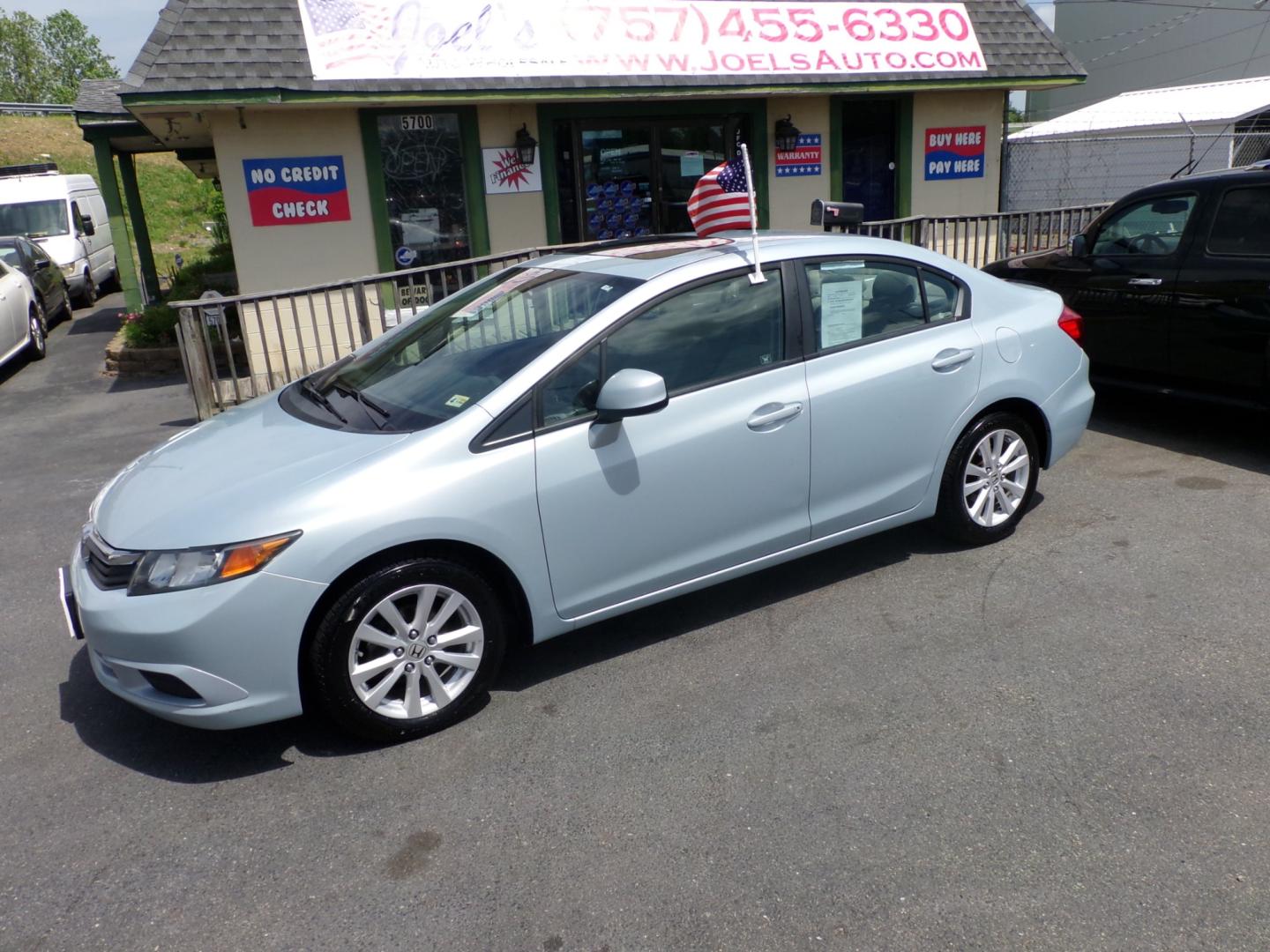 2012 Blue Honda Civic EX Sedan 5-Speed AT (19XFB2F83CE) with an 1.8L L4 SOHC 16V engine, 5-Speed Automatic transmission, located at 5700 Curlew Drive, Norfolk, VA, 23502, (757) 455-6330, 36.841885, -76.209412 - Photo#0