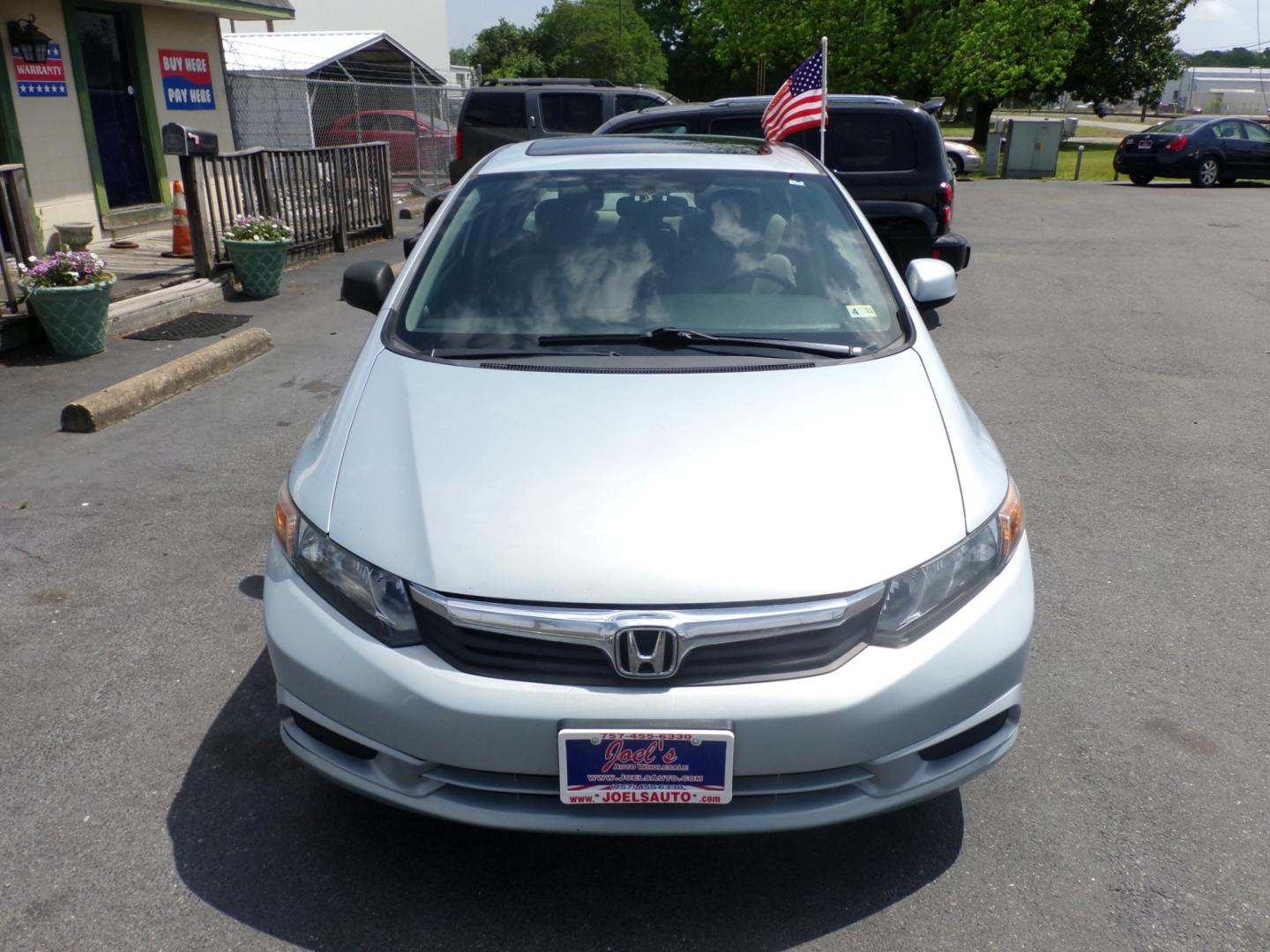 2012 Blue Honda Civic EX Sedan 5-Speed AT (19XFB2F83CE) with an 1.8L L4 SOHC 16V engine, 5-Speed Automatic transmission, located at 5700 Curlew Drive, Norfolk, VA, 23502, (757) 455-6330, 36.841885, -76.209412 - Photo#3