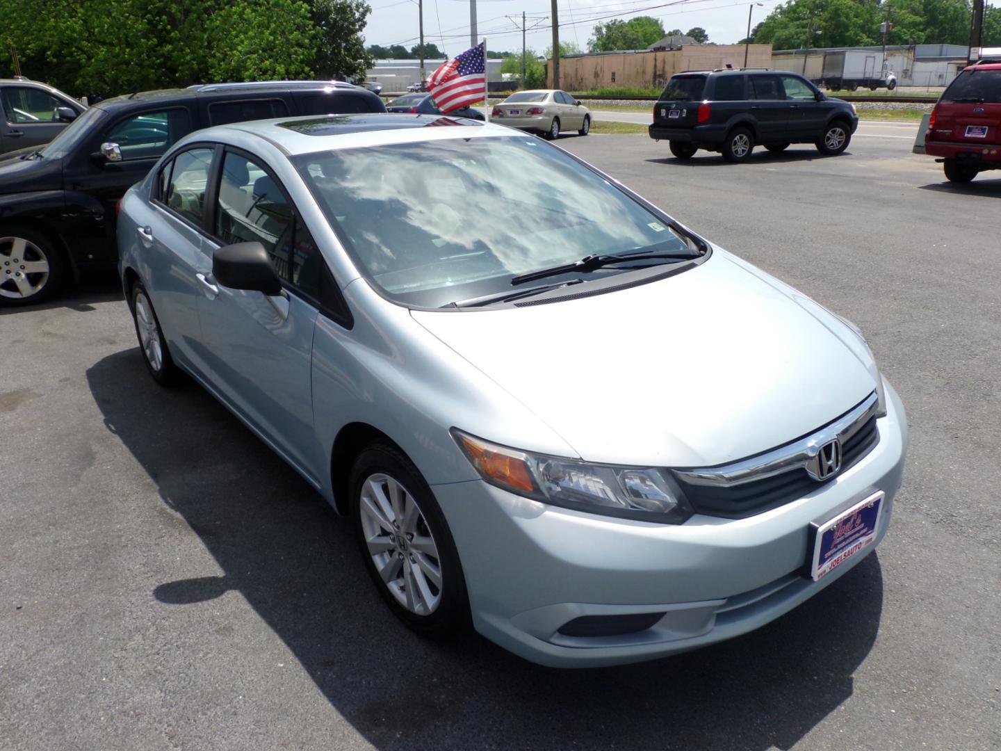 2012 Blue Honda Civic EX Sedan 5-Speed AT (19XFB2F83CE) with an 1.8L L4 SOHC 16V engine, 5-Speed Automatic transmission, located at 5700 Curlew Drive, Norfolk, VA, 23502, (757) 455-6330, 36.841885, -76.209412 - Photo#4