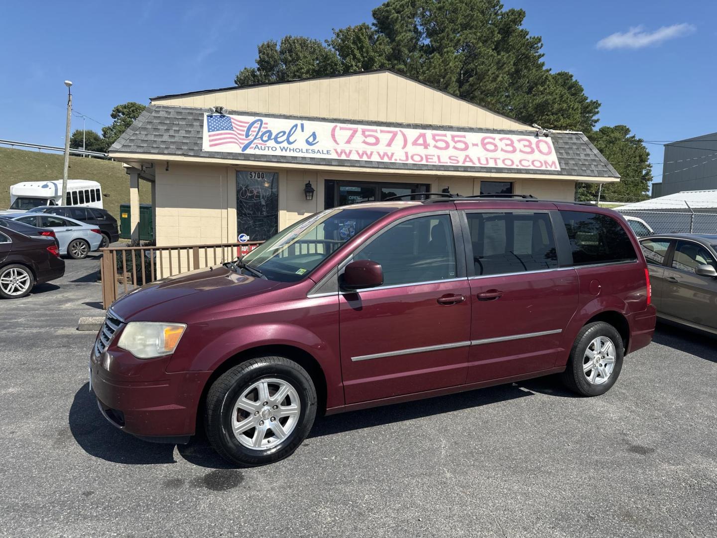 2009 Red Chrysler Town & Country Touring (2A8HR541X9R) , 6-Speed Automatic Overdrive transmission, located at 5700 Curlew Drive, Norfolk, VA, 23502, (757) 455-6330, 36.841885, -76.209412 - Photo#0