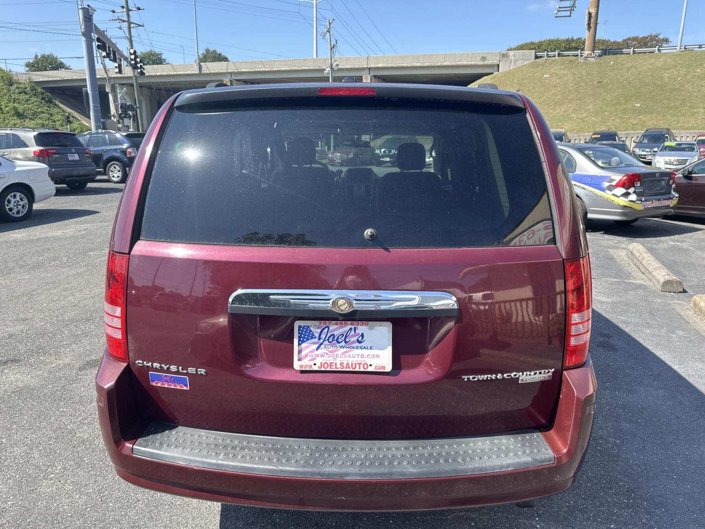 2009 Red Chrysler Town & Country Touring (2A8HR541X9R) , 6-Speed Automatic Overdrive transmission, located at 5700 Curlew Drive, Norfolk, VA, 23502, (757) 455-6330, 36.841885, -76.209412 - Photo#2