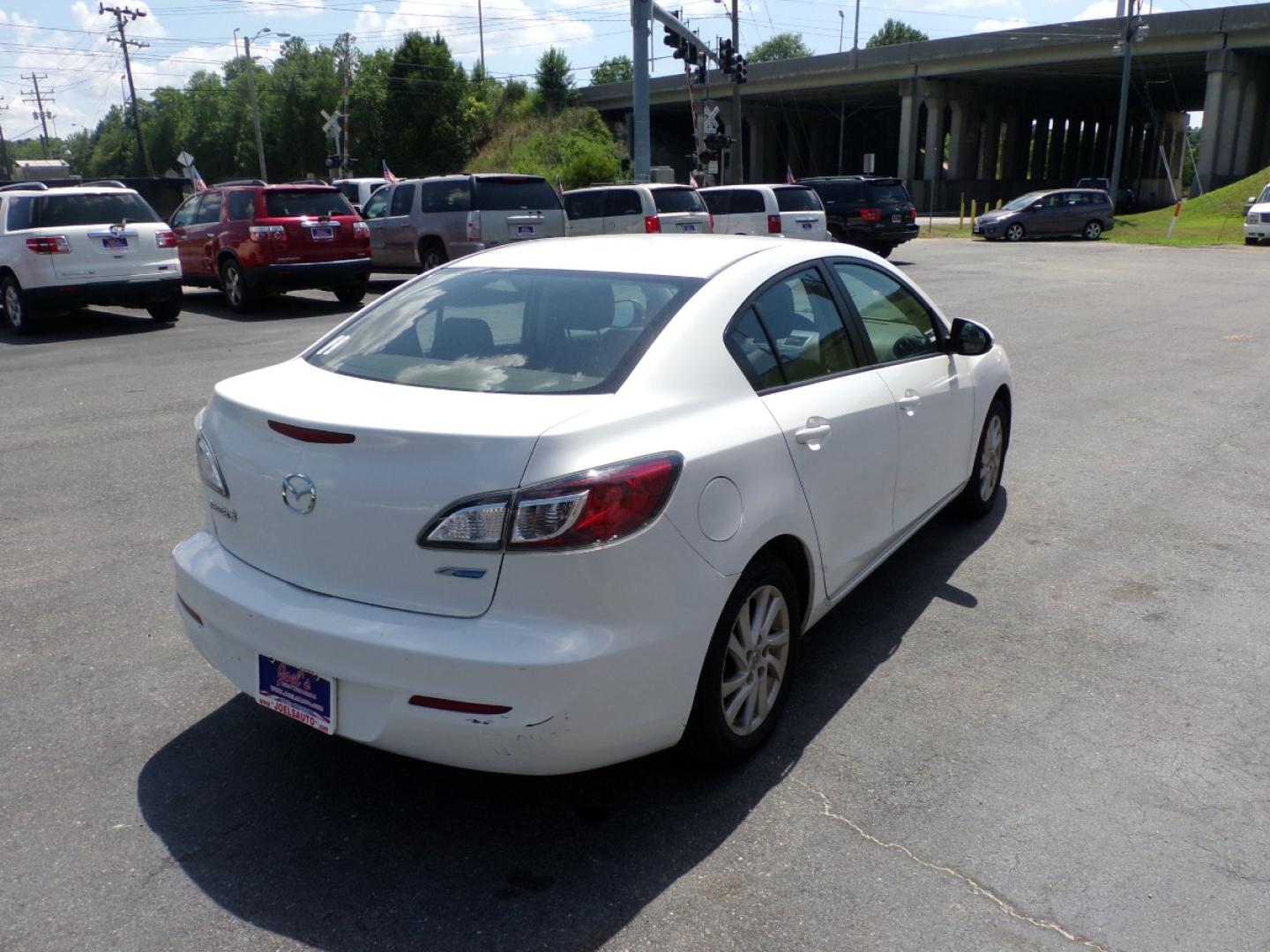 2012 white Mazda MAZDA3 i Touring 4-Door (JM1BL1V79C1) with an 2.0L L4 DOHC 16V engine, located at 5700 Curlew Drive, Norfolk, VA, 23502, (757) 455-6330, 36.841885, -76.209412 - Photo#20