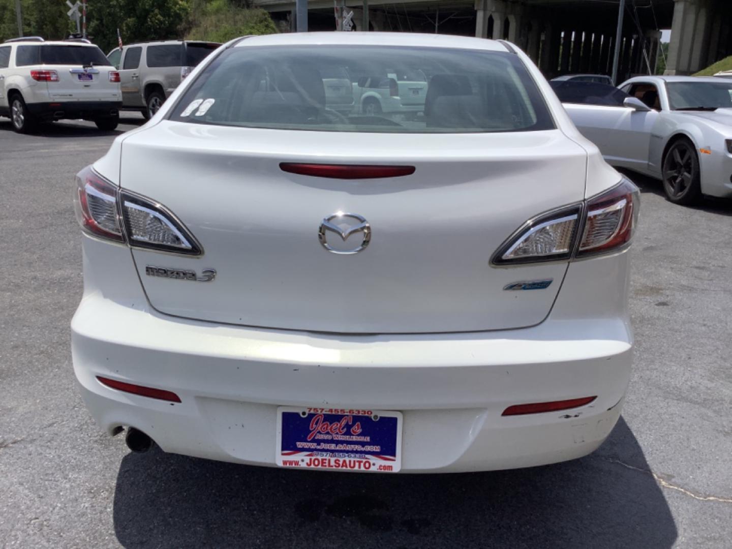 2012 white Mazda MAZDA3 i Touring 4-Door (JM1BL1V79C1) with an 2.0L L4 DOHC 16V engine, located at 5700 Curlew Drive, Norfolk, VA, 23502, (757) 455-6330, 36.841885, -76.209412 - Photo#7