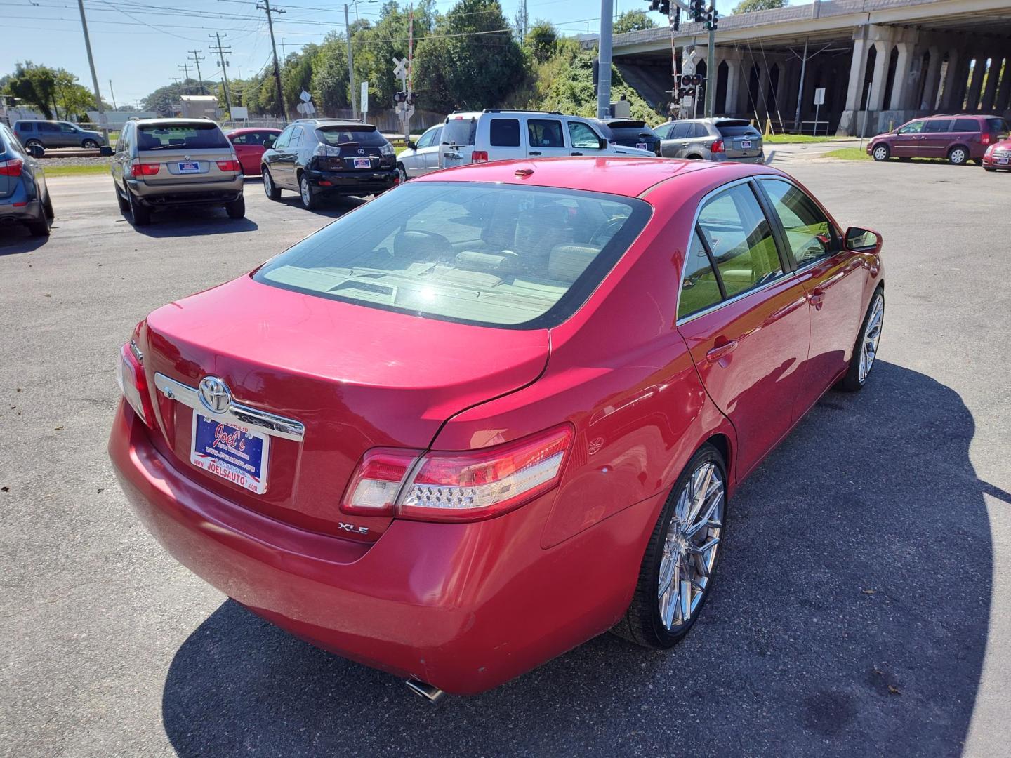 2010 Red Toyota Camry LE V6 6-Spd AT (4T1BK3EK3AU) with an 3.5L V6 DOHC 24V engine, 6-Speed Automatic transmission, located at 5700 Curlew Drive, Norfolk, VA, 23502, (757) 455-6330, 36.841885, -76.209412 - Photo#12