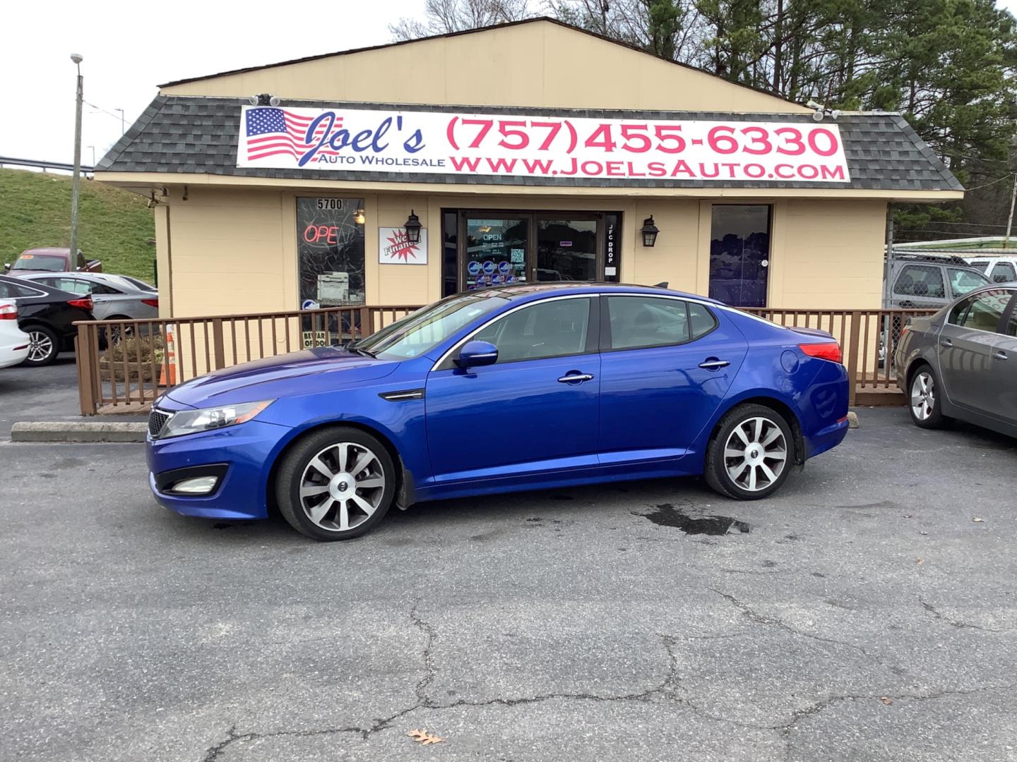 2013 Blue Kia Optima SX (5XXGR4A63DG) with an 2.0L L4 DOHC 16V TURBO engine, 6-Speed Automatic transmission, located at 5700 Curlew Drive, Norfolk, VA, 23502, (757) 455-6330, 36.841885, -76.209412 - Photo#0