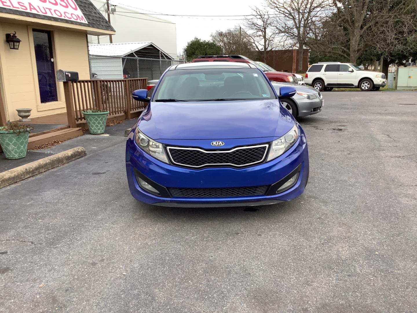 2013 Blue Kia Optima SX (5XXGR4A63DG) with an 2.0L L4 DOHC 16V TURBO engine, 6-Speed Automatic transmission, located at 5700 Curlew Drive, Norfolk, VA, 23502, (757) 455-6330, 36.841885, -76.209412 - Photo#5