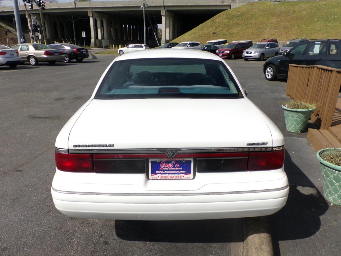 1996 White /blue Mercury Grand Marquis GS (2MELM74WXTX) with an 4.6L V8 SOHC 16V engine, 4-Speed Automatic Overdrive transmission, located at 5700 Curlew Drive, Norfolk, VA, 23502, (757) 455-6330, 36.841885, -76.209412 - Photo#10