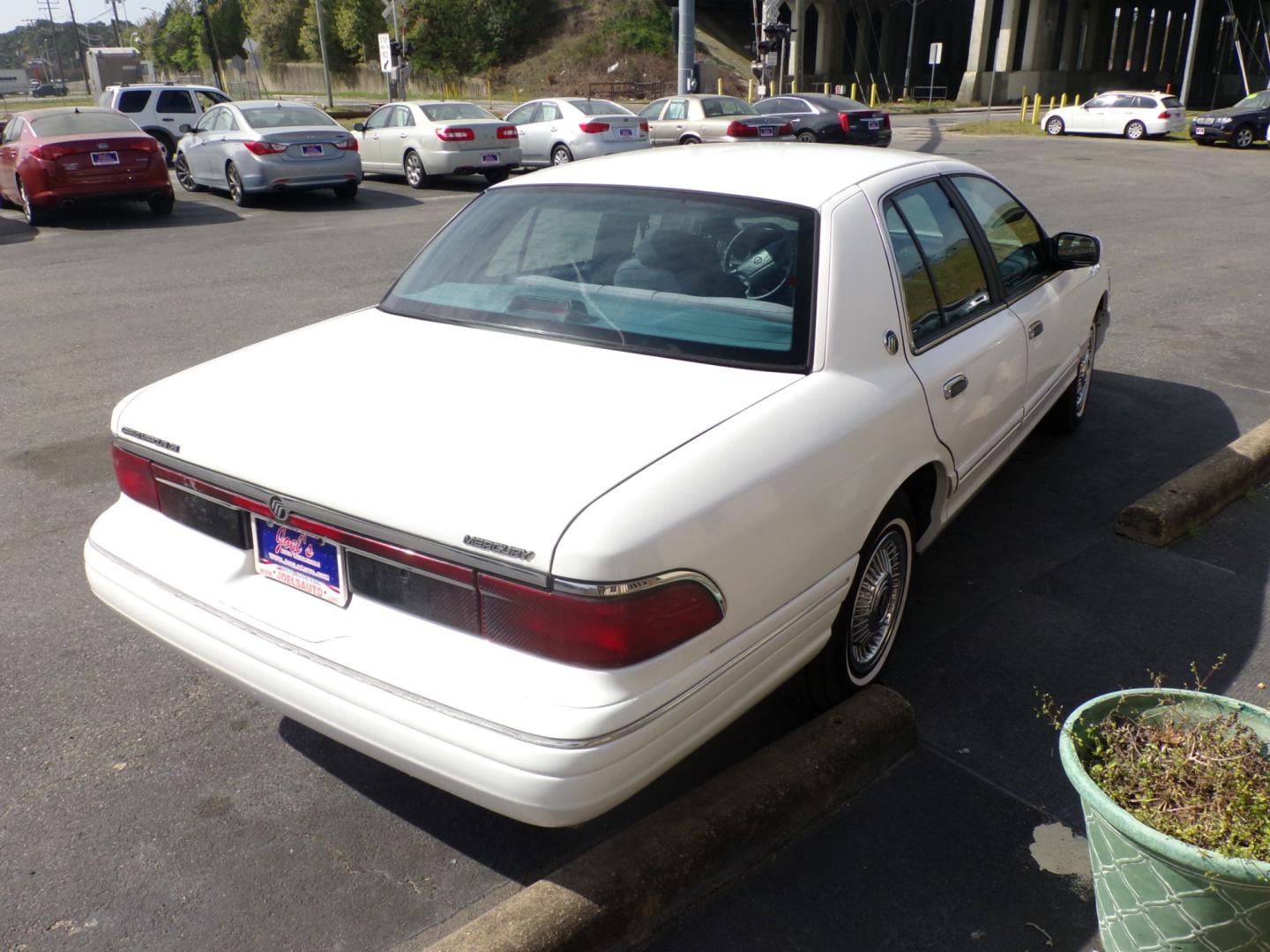 1996 White /blue Mercury Grand Marquis GS (2MELM74WXTX) with an 4.6L V8 SOHC 16V engine, 4-Speed Automatic Overdrive transmission, located at 5700 Curlew Drive, Norfolk, VA, 23502, (757) 455-6330, 36.841885, -76.209412 - Photo#11