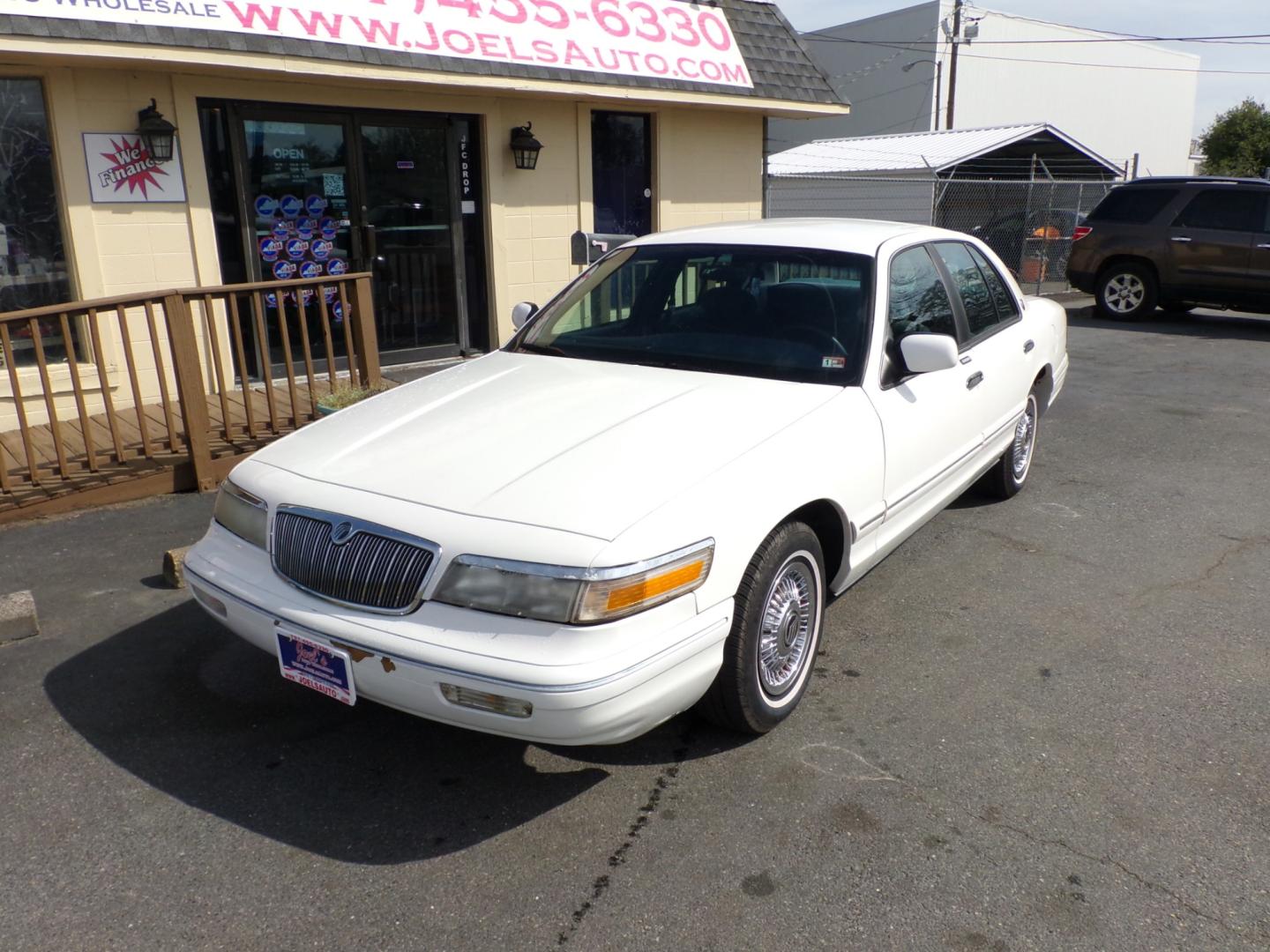 1996 White /blue Mercury Grand Marquis GS (2MELM74WXTX) with an 4.6L V8 SOHC 16V engine, 4-Speed Automatic Overdrive transmission, located at 5700 Curlew Drive, Norfolk, VA, 23502, (757) 455-6330, 36.841885, -76.209412 - Photo#3