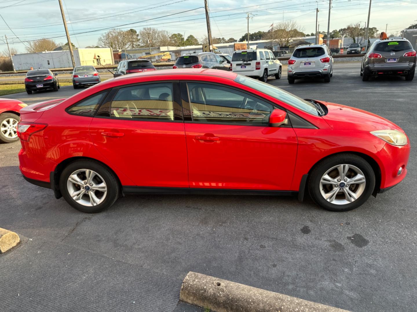 2012 Red Ford Focus SE Sedan (1FAHP3F26CL) with an 2.0L L4 DOHC 16V engine, located at 5700 Curlew Drive, Norfolk, VA, 23502, (757) 455-6330, 36.841885, -76.209412 - Photo#5