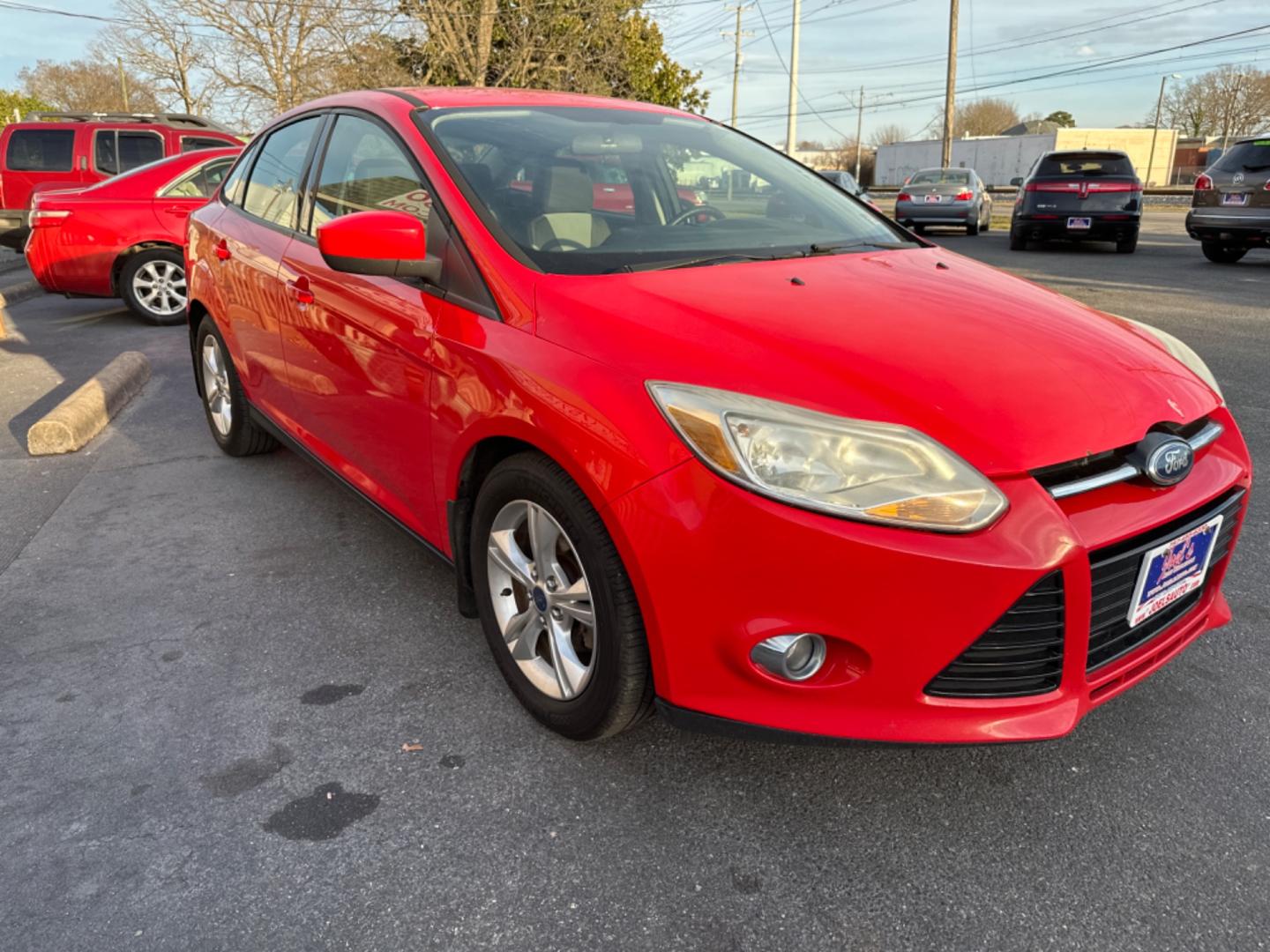 2012 Red Ford Focus SE Sedan (1FAHP3F26CL) with an 2.0L L4 DOHC 16V engine, located at 5700 Curlew Drive, Norfolk, VA, 23502, (757) 455-6330, 36.841885, -76.209412 - Photo#6