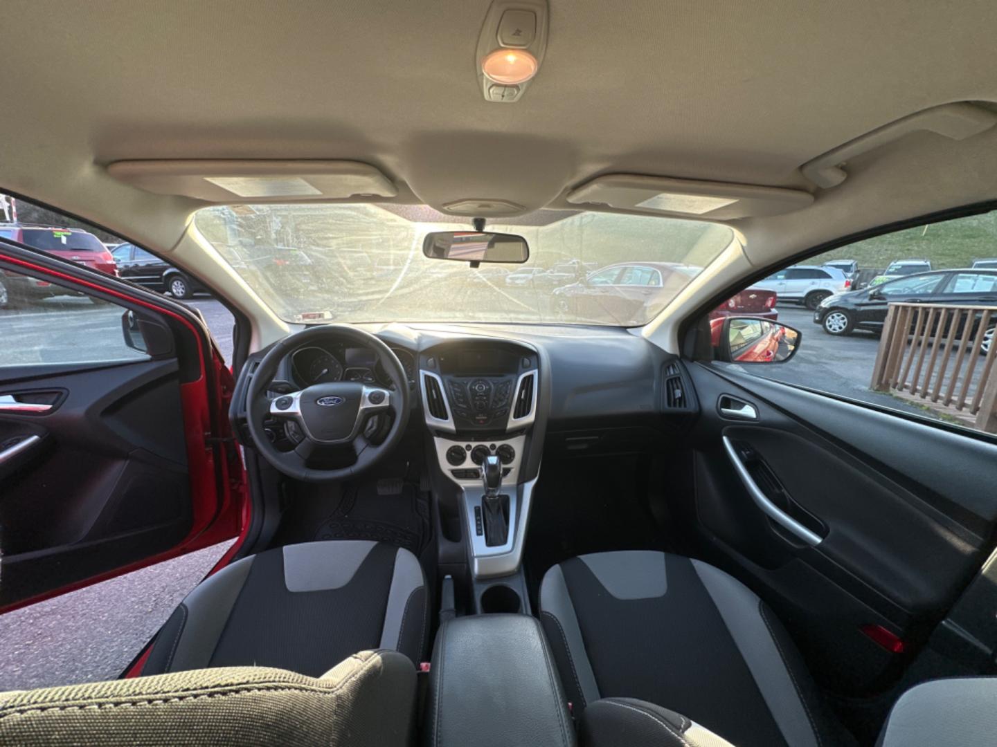 2012 Red Ford Focus SE Sedan (1FAHP3F26CL) with an 2.0L L4 DOHC 16V engine, located at 5700 Curlew Drive, Norfolk, VA, 23502, (757) 455-6330, 36.841885, -76.209412 - Photo#9