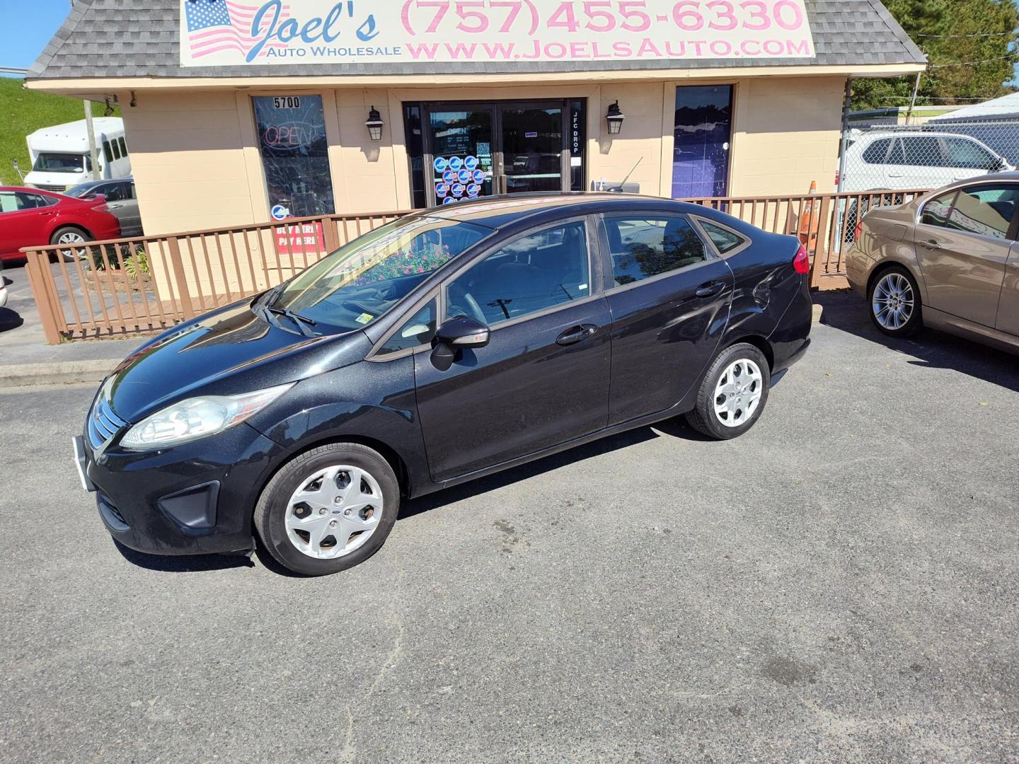 2013 Black Ford Fiesta SE Sedan (3FADP4BJ0DM) with an 1.6L L4 DOHC 16V engine, located at 5700 Curlew Drive, Norfolk, VA, 23502, (757) 455-6330, 36.841885, -76.209412 - Photo#0