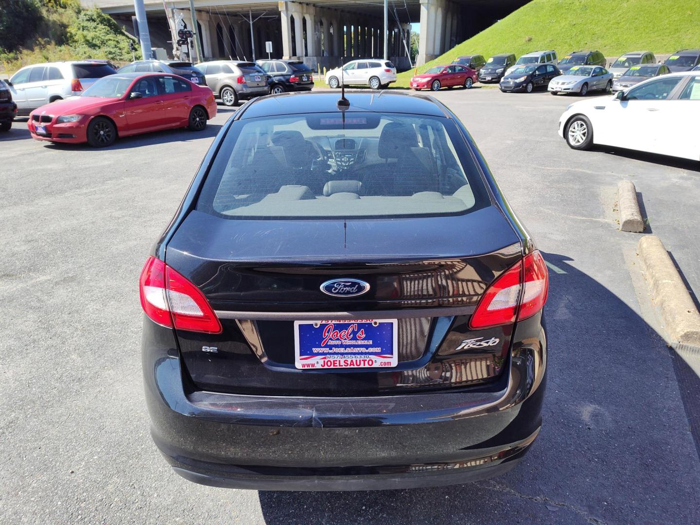 2013 Black Ford Fiesta SE Sedan (3FADP4BJ0DM) with an 1.6L L4 DOHC 16V engine, located at 5700 Curlew Drive, Norfolk, VA, 23502, (757) 455-6330, 36.841885, -76.209412 - Photo#12