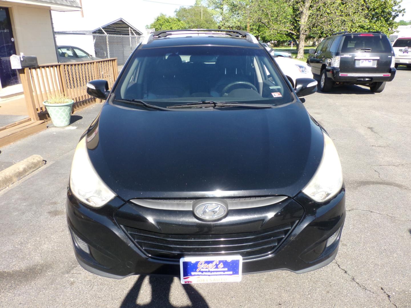 2012 Black Hyundai Tucson Limited 2WD (KM8JU3ACXCU) with an 2.4L L4 DOHC 16V engine, 6-Speed Automatic transmission, located at 5700 Curlew Drive, Norfolk, VA, 23502, (757) 455-6330, 36.841885, -76.209412 - Photo#2