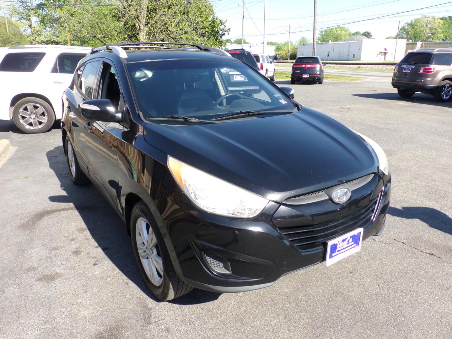 2012 Black Hyundai Tucson Limited 2WD (KM8JU3ACXCU) with an 2.4L L4 DOHC 16V engine, 6-Speed Automatic transmission, located at 5700 Curlew Drive, Norfolk, VA, 23502, (757) 455-6330, 36.841885, -76.209412 - Photo#3