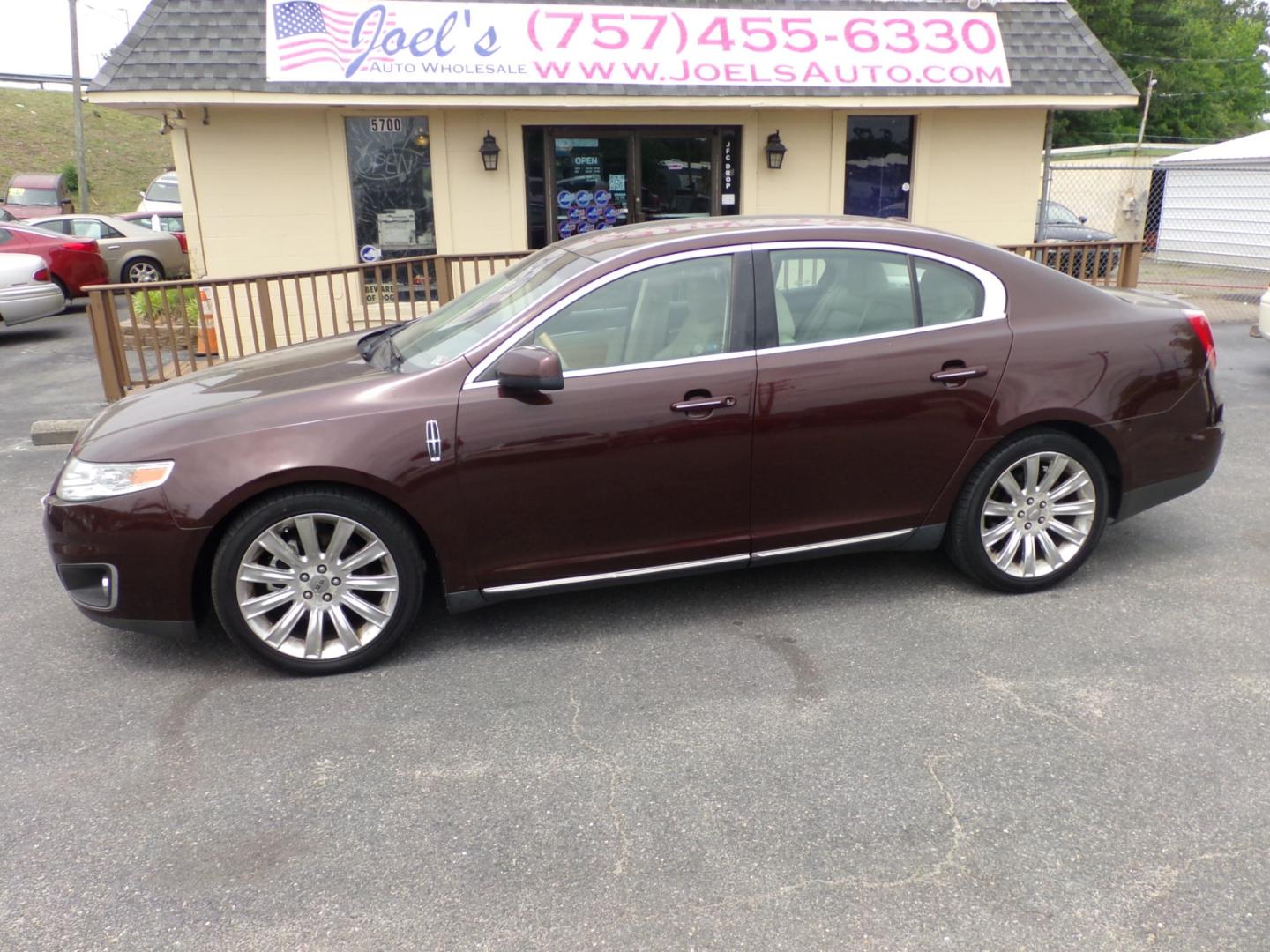 2010 Burgundy Lincoln MKS 3.5L with EcoBoost AWD (1LNHL9FTXAG) with an 3.5L V6 DOHC 24V engine, 6-Speed Automatic transmission, located at 5700 Curlew Drive, Norfolk, VA, 23502, (757) 455-6330, 36.841885, -76.209412 - Photo#0