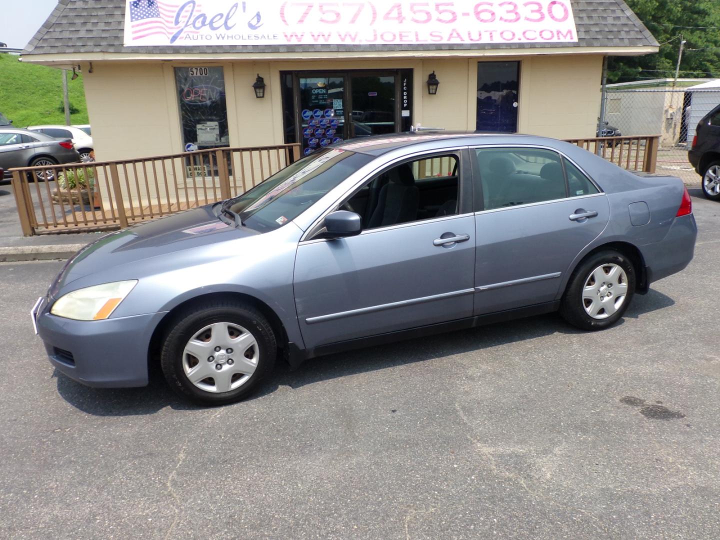 2007 Blue Honda Accord LX Sedan AT (1HGCM56477A) with an 2.4L L4 DOHC 16V engine, 5-Speed Automatic Overdrive transmission, located at 5700 Curlew Drive, Norfolk, VA, 23502, (757) 455-6330, 36.841885, -76.209412 - Photo#0