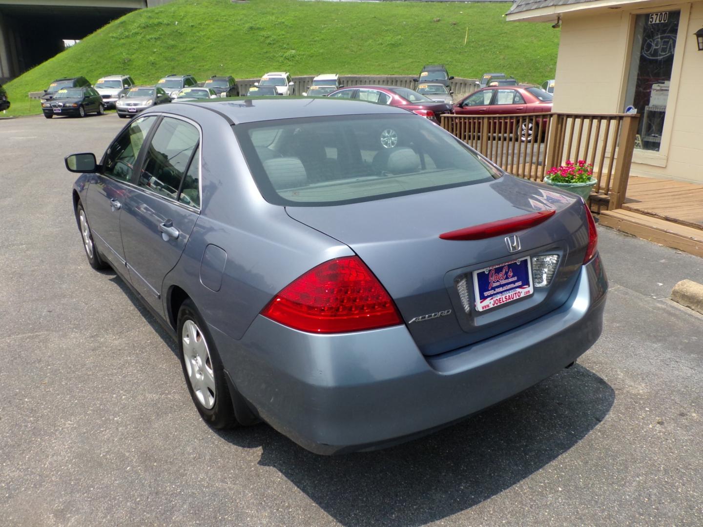 2007 Blue Honda Accord LX Sedan AT (1HGCM56477A) with an 2.4L L4 DOHC 16V engine, 5-Speed Automatic Overdrive transmission, located at 5700 Curlew Drive, Norfolk, VA, 23502, (757) 455-6330, 36.841885, -76.209412 - Photo#11