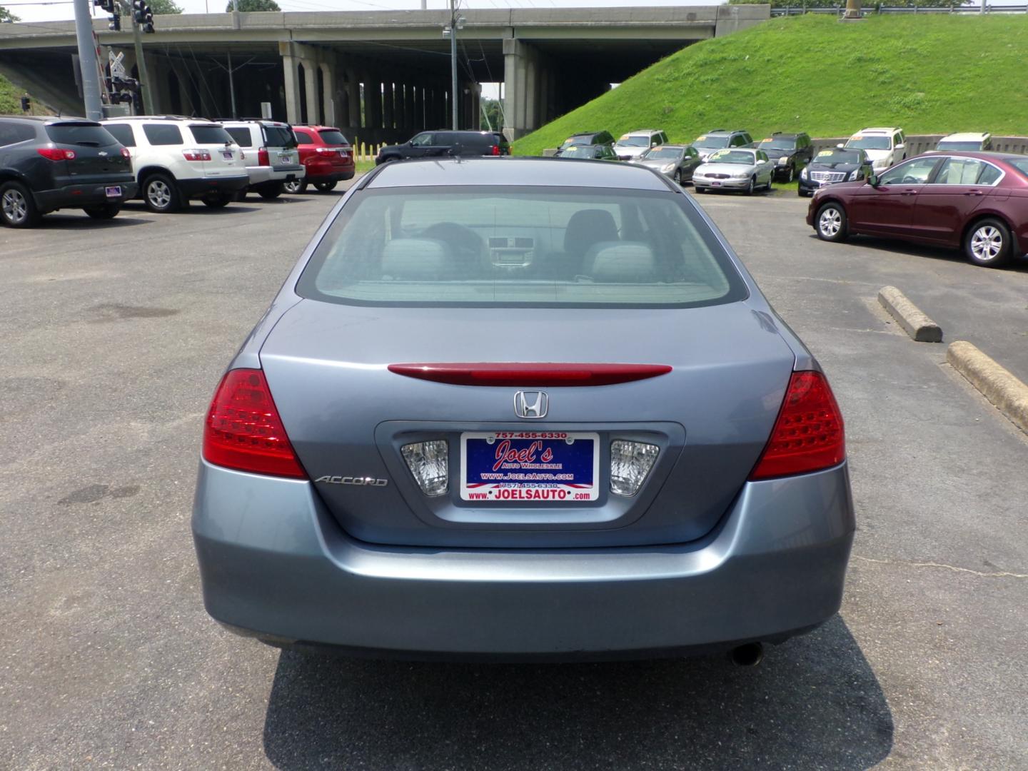 2007 Blue Honda Accord LX Sedan AT (1HGCM56477A) with an 2.4L L4 DOHC 16V engine, 5-Speed Automatic Overdrive transmission, located at 5700 Curlew Drive, Norfolk, VA, 23502, (757) 455-6330, 36.841885, -76.209412 - Photo#12