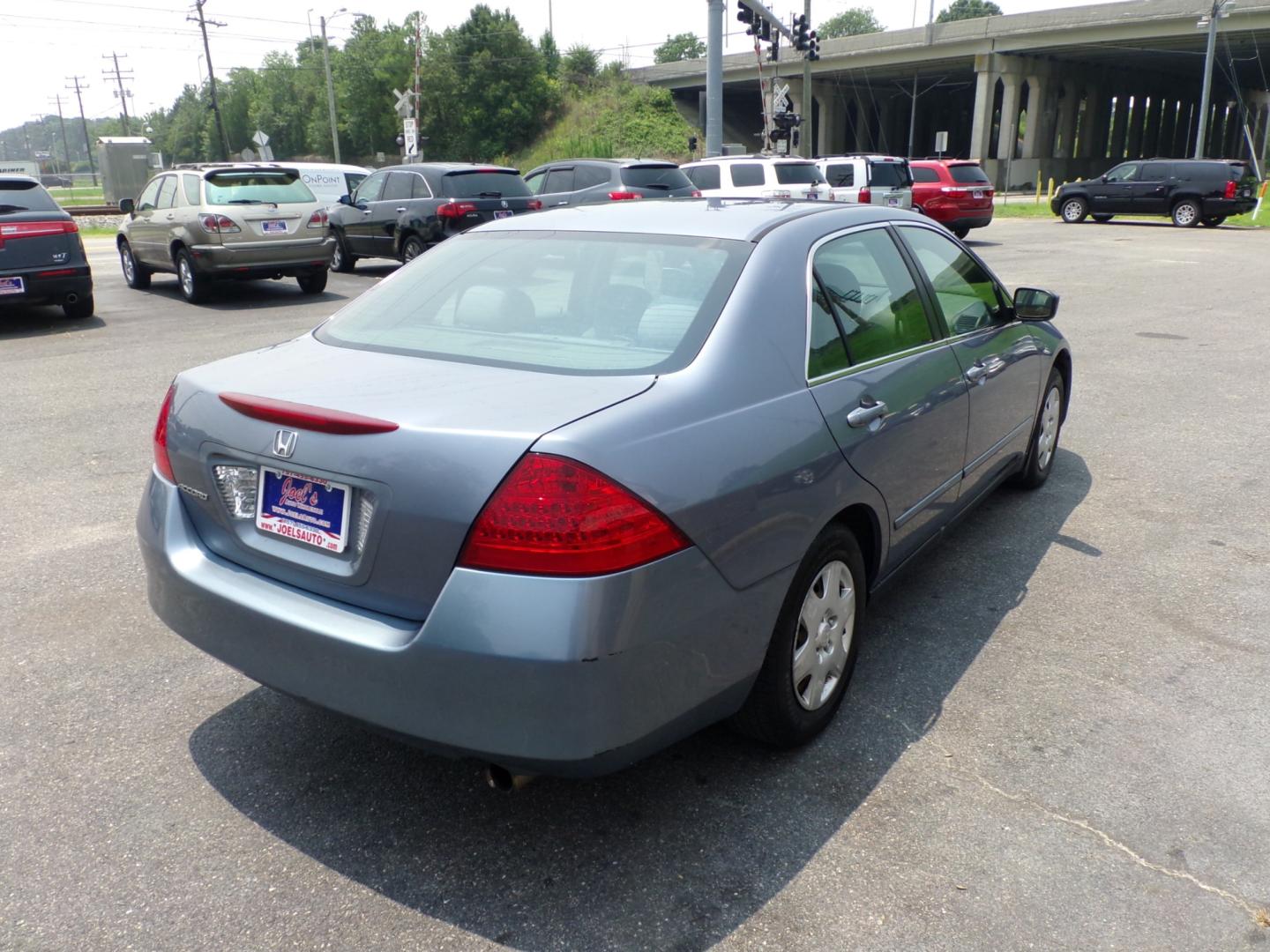 2007 Blue Honda Accord LX Sedan AT (1HGCM56477A) with an 2.4L L4 DOHC 16V engine, 5-Speed Automatic Overdrive transmission, located at 5700 Curlew Drive, Norfolk, VA, 23502, (757) 455-6330, 36.841885, -76.209412 - Photo#13