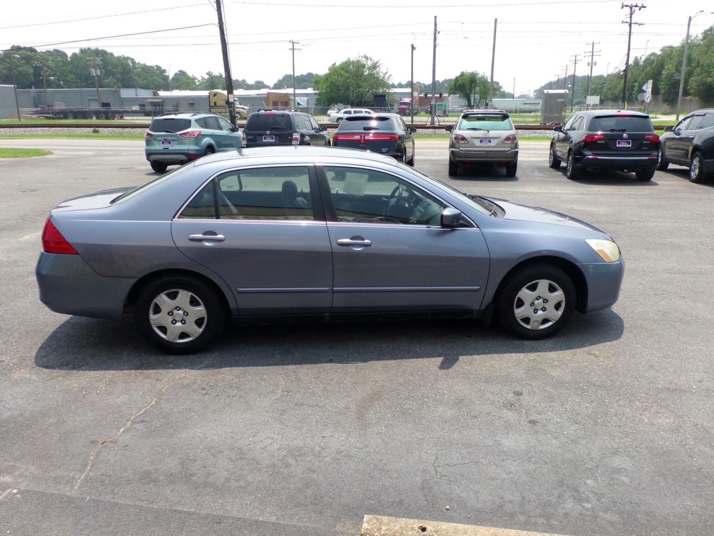 2007 Blue Honda Accord LX Sedan AT (1HGCM56477A) with an 2.4L L4 DOHC 16V engine, 5-Speed Automatic Overdrive transmission, located at 5700 Curlew Drive, Norfolk, VA, 23502, (757) 455-6330, 36.841885, -76.209412 - Photo#14