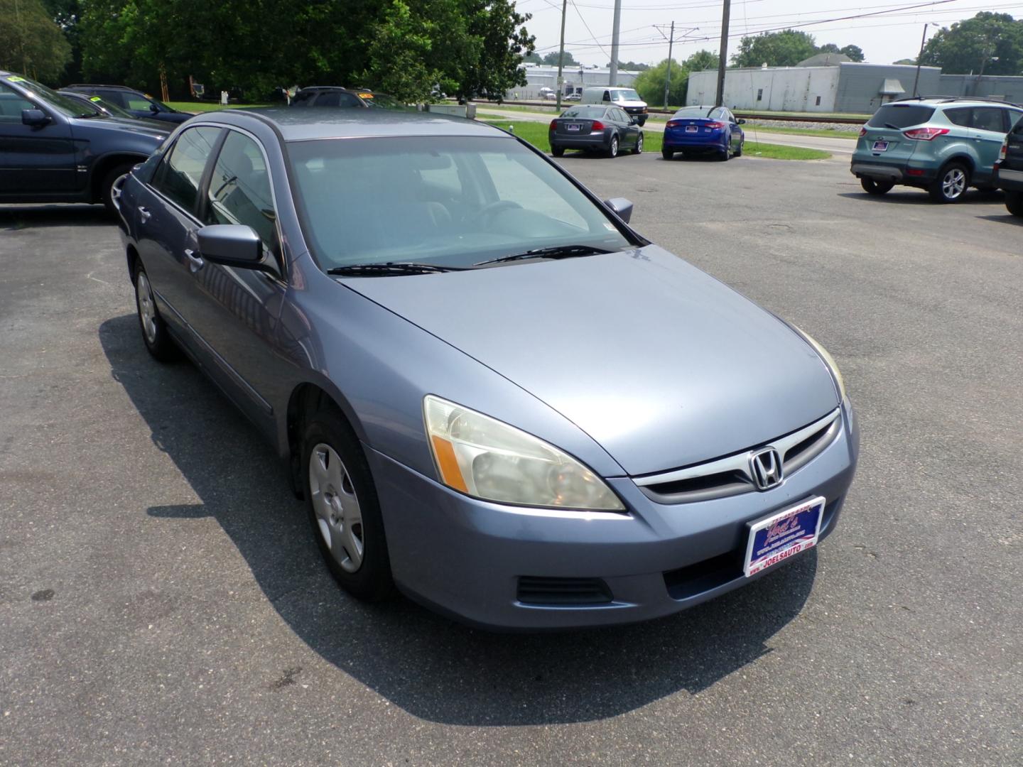 2007 Blue Honda Accord LX Sedan AT (1HGCM56477A) with an 2.4L L4 DOHC 16V engine, 5-Speed Automatic Overdrive transmission, located at 5700 Curlew Drive, Norfolk, VA, 23502, (757) 455-6330, 36.841885, -76.209412 - Photo#4