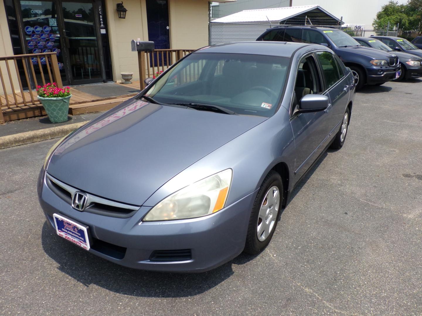 2007 Blue Honda Accord LX Sedan AT (1HGCM56477A) with an 2.4L L4 DOHC 16V engine, 5-Speed Automatic Overdrive transmission, located at 5700 Curlew Drive, Norfolk, VA, 23502, (757) 455-6330, 36.841885, -76.209412 - Photo#5