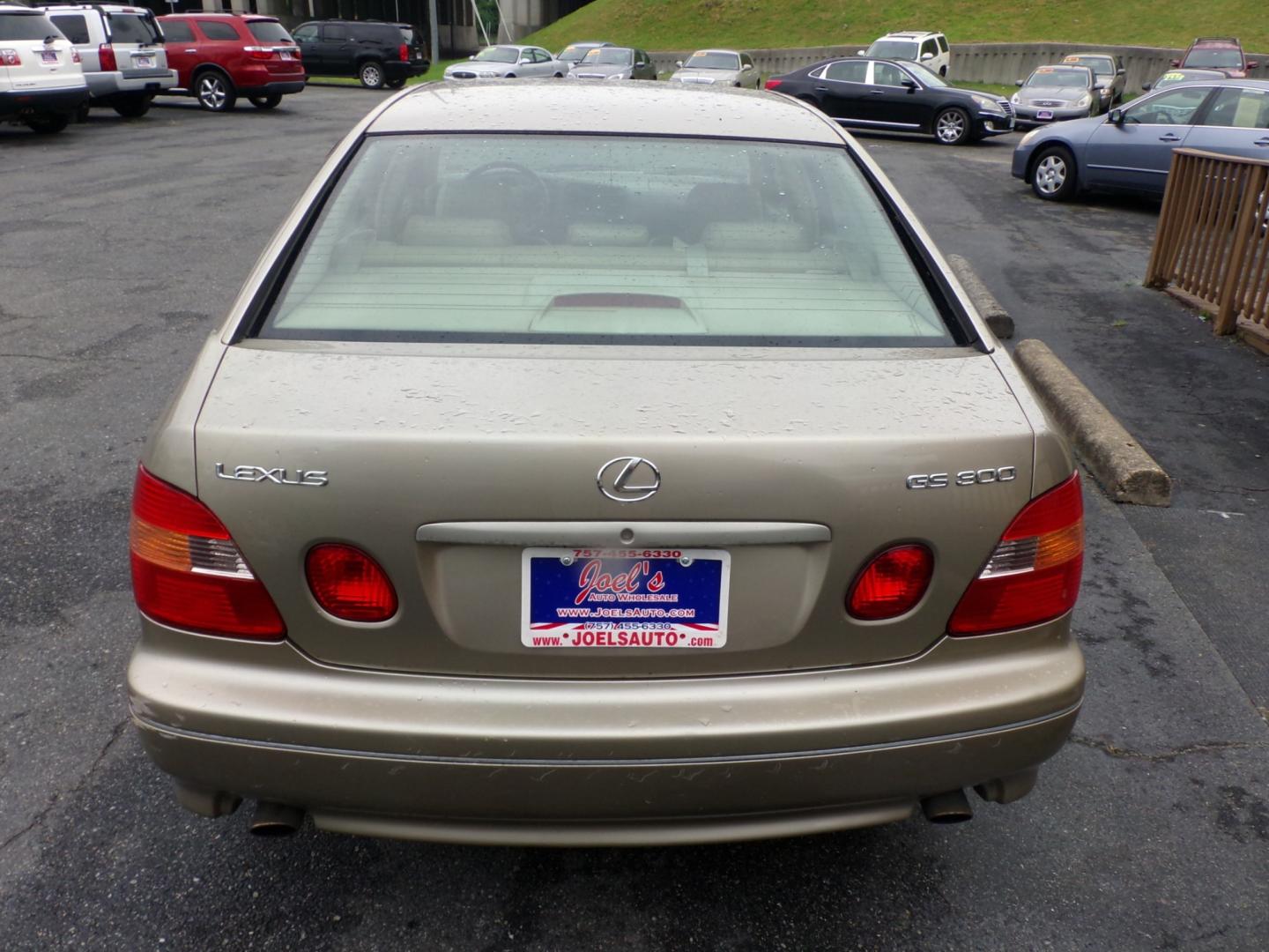 1999 Gold Lexus GS 300/400 GS 300 (JT8BD68SXX0) with an 3.0L L6 DOHC 24V engine, 5-Speed Automatic Overdrive transmission, located at 5700 Curlew Drive, Norfolk, VA, 23502, (757) 455-6330, 36.841885, -76.209412 - Photo#12