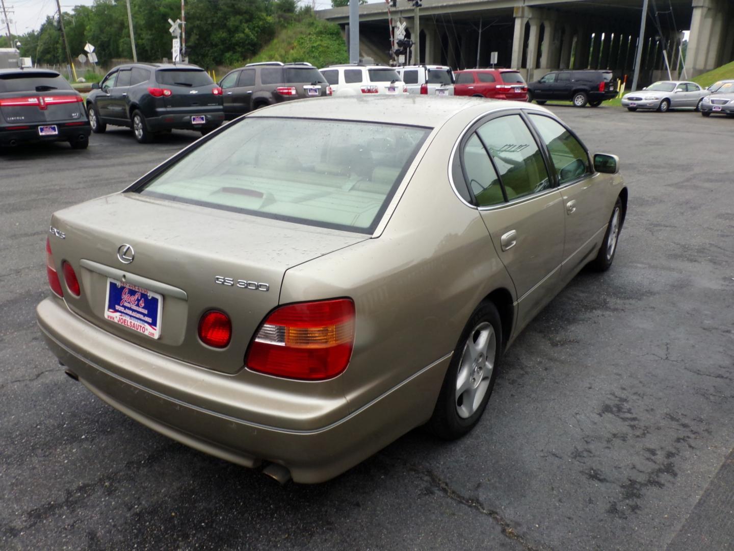 1999 Gold Lexus GS 300/400 GS 300 (JT8BD68SXX0) with an 3.0L L6 DOHC 24V engine, 5-Speed Automatic Overdrive transmission, located at 5700 Curlew Drive, Norfolk, VA, 23502, (757) 455-6330, 36.841885, -76.209412 - Photo#13