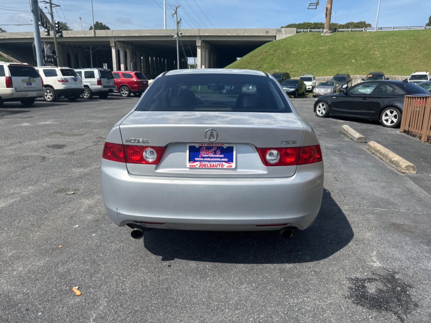 2004 Silver Acura TSX 6-speed MT with Navigation System (JH4CL95954C) with an 2.4L L4 DOHC 16V engine, 6-Speed Manual Overdrive transmission, located at 5700 Curlew Drive, Norfolk, VA, 23502, (757) 455-6330, 36.841885, -76.209412 - Photo#4