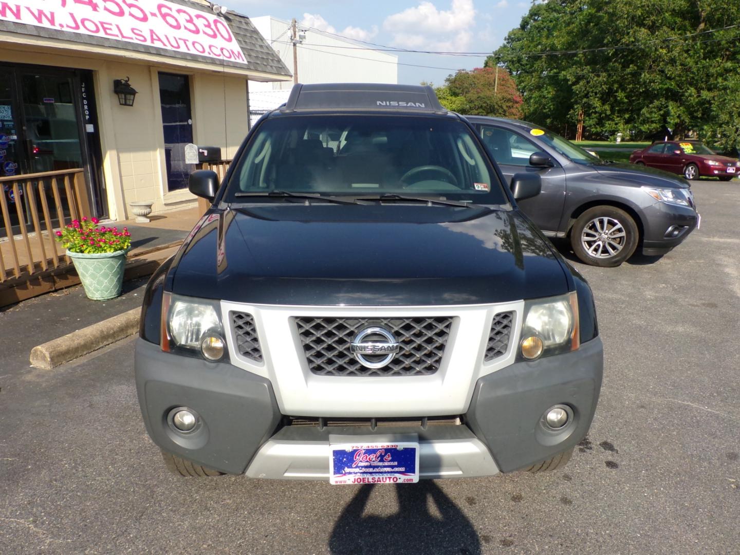 2010 Black Nissan Xterra Off-Road 4WD (5N1AN0NW7AC) with an 4.0L V6 DOHC 24V engine, located at 5700 Curlew Drive, Norfolk, VA, 23502, (757) 455-6330, 36.841885, -76.209412 - Photo#3