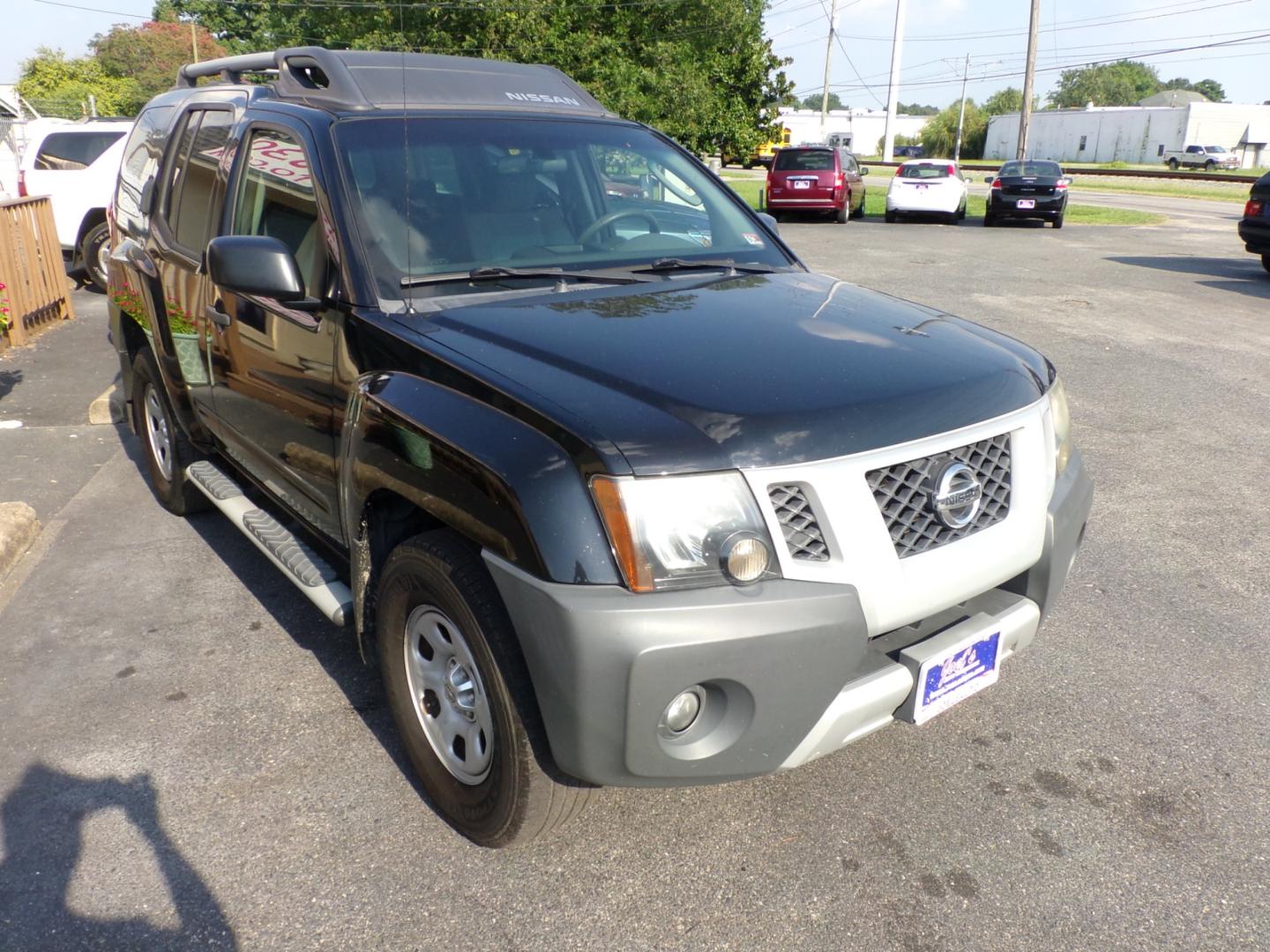 2010 Black Nissan Xterra Off-Road 4WD (5N1AN0NW7AC) with an 4.0L V6 DOHC 24V engine, located at 5700 Curlew Drive, Norfolk, VA, 23502, (757) 455-6330, 36.841885, -76.209412 - Photo#4