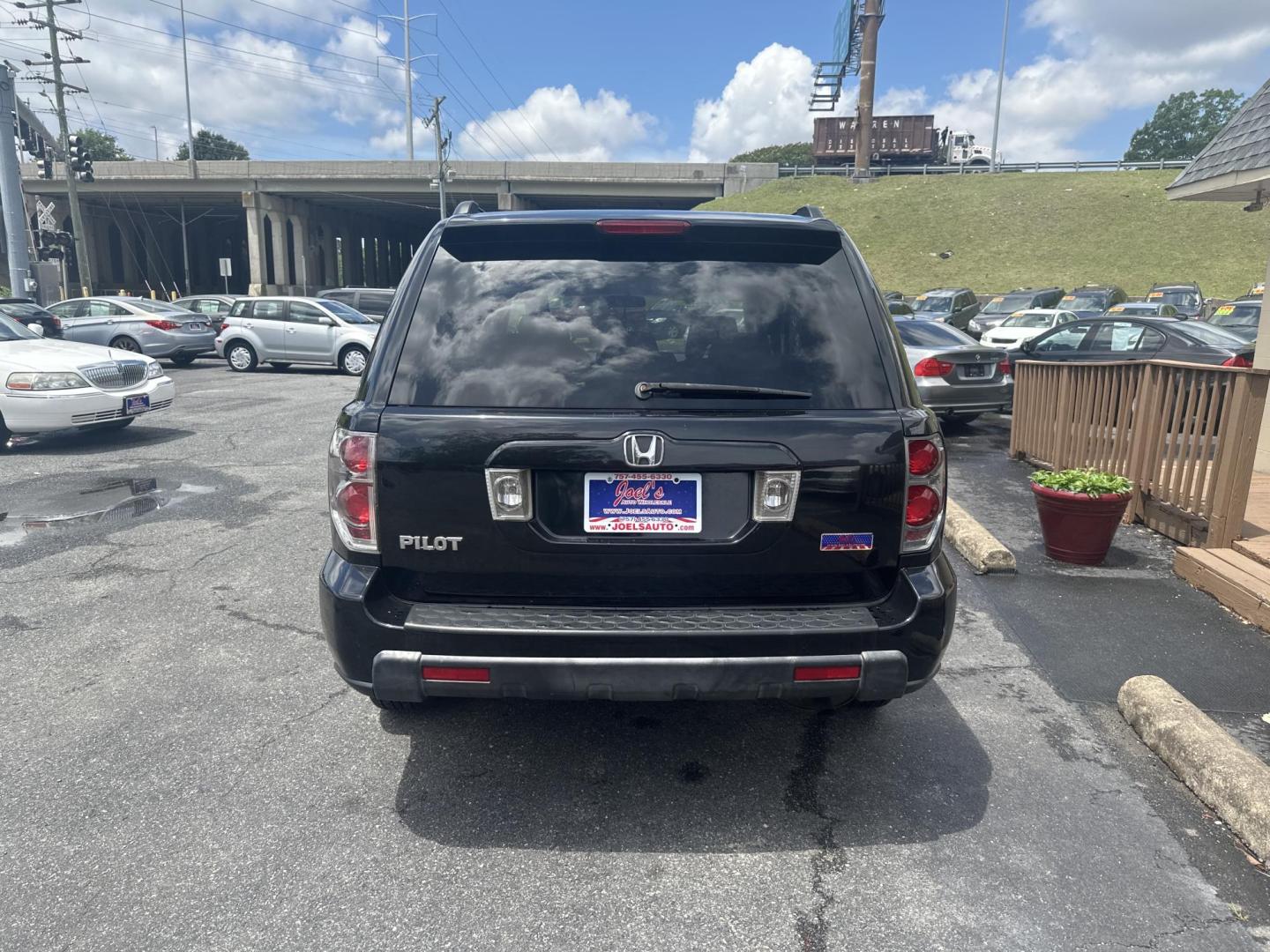 2006 Black Honda Pilot EX (5FNYF28426B) with an 3.5L V6 SOHC 24V engine, 5-Speed Automatic Overdrive transmission, located at 5700 Curlew Drive, Norfolk, VA, 23502, (757) 455-6330, 36.841885, -76.209412 - Photo#2