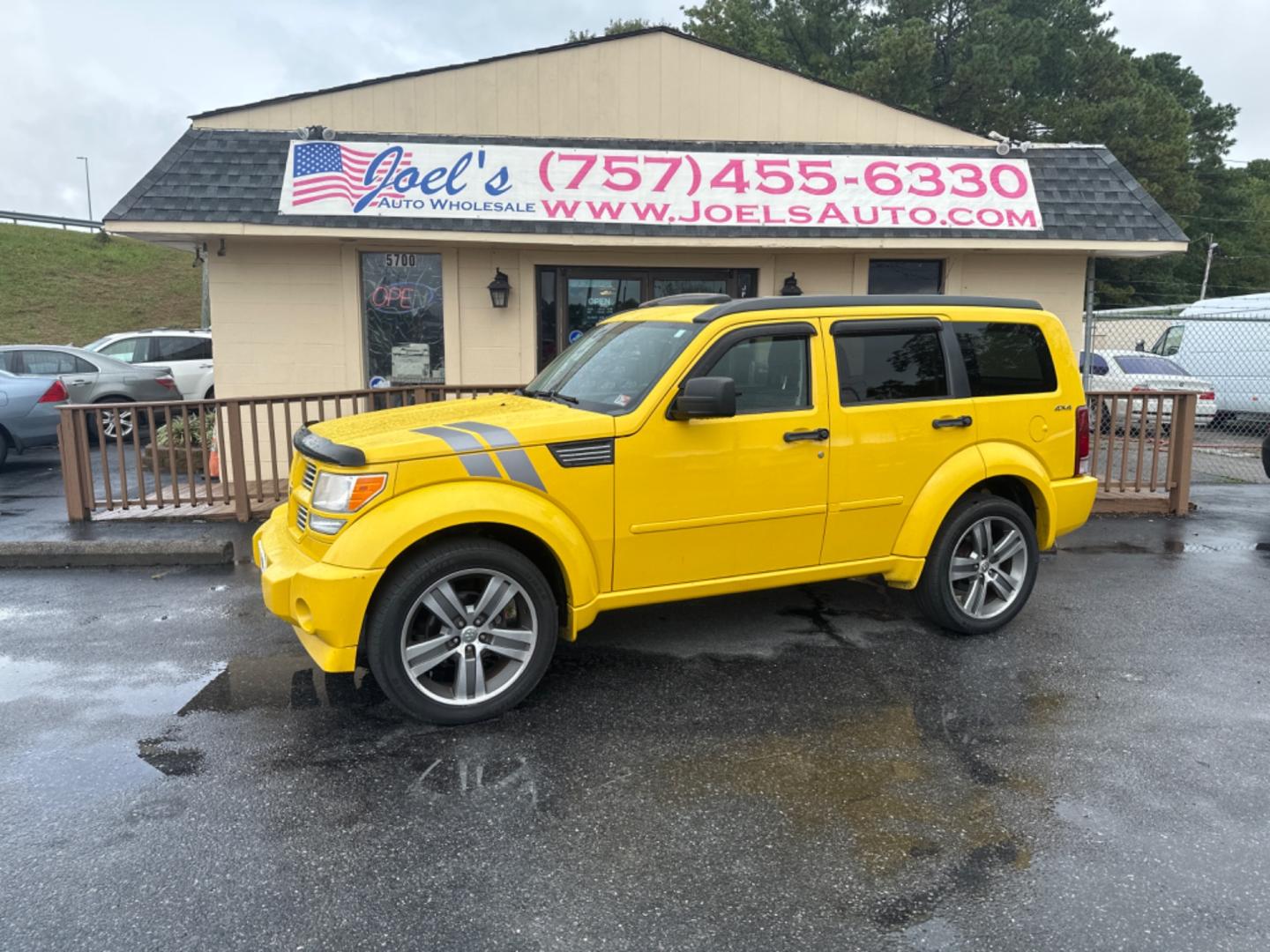 2011 Yellow /black Dodge Nitro Detonator 4WD (1D4PU6GX4BW) with an 4.0L V6 SOHC 24V engine, 5-Speed Automatic transmission, located at 5700 Curlew Drive, Norfolk, VA, 23502, (757) 455-6330, 36.841885, -76.209412 - Photo#0