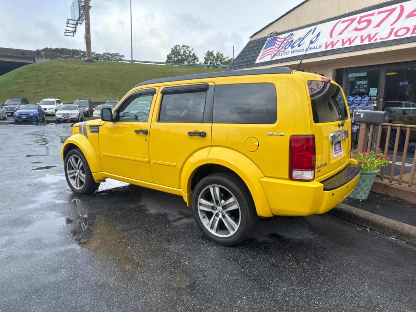 2011 Yellow /black Dodge Nitro Detonator 4WD (1D4PU6GX4BW) with an 4.0L V6 SOHC 24V engine, 5-Speed Automatic transmission, located at 5700 Curlew Drive, Norfolk, VA, 23502, (757) 455-6330, 36.841885, -76.209412 - Photo#3