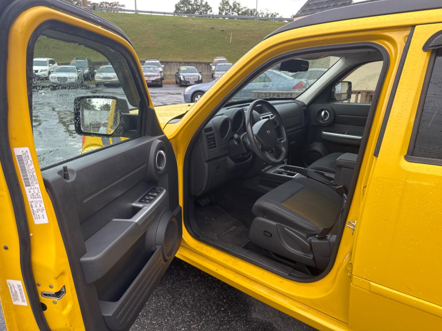 2011 Yellow /black Dodge Nitro Detonator 4WD (1D4PU6GX4BW) with an 4.0L V6 SOHC 24V engine, 5-Speed Automatic transmission, located at 5700 Curlew Drive, Norfolk, VA, 23502, (757) 455-6330, 36.841885, -76.209412 - Photo#7