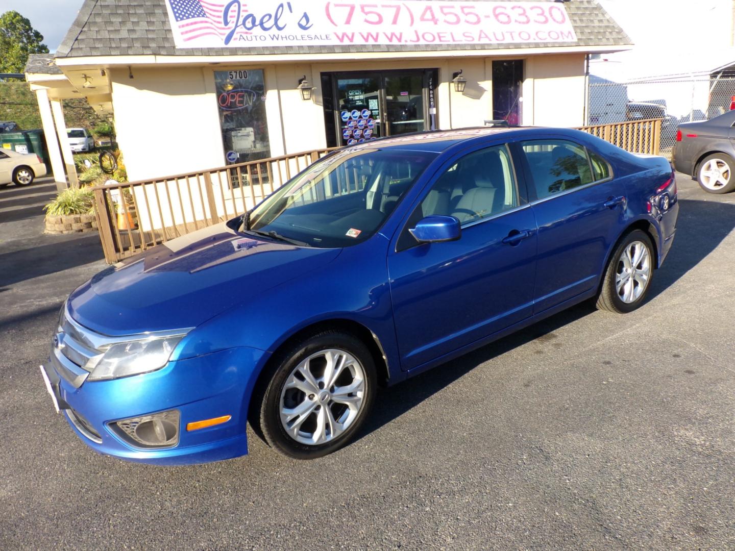 2012 Blue Ford Fusion SE (3FAHP0HAXCR) with an 2.5L L4 DOHC 16V engine, located at 5700 Curlew Drive, Norfolk, VA, 23502, (757) 455-6330, 36.841885, -76.209412 - Photo#0