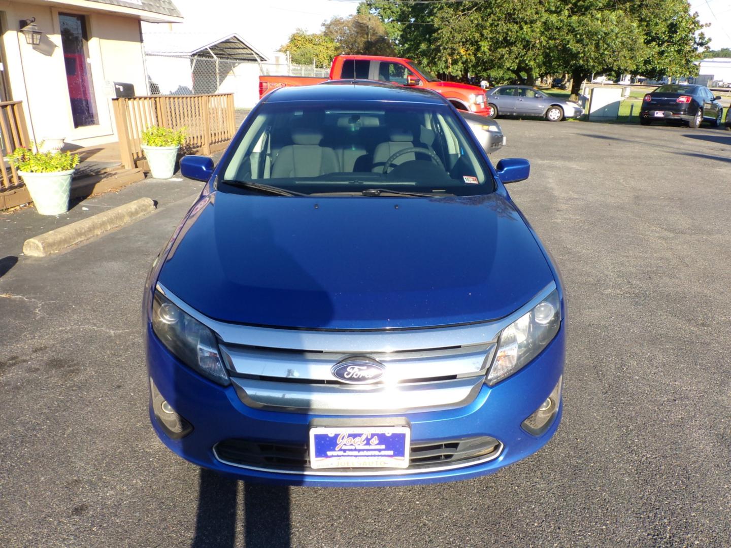 2012 Blue Ford Fusion SE (3FAHP0HAXCR) with an 2.5L L4 DOHC 16V engine, located at 5700 Curlew Drive, Norfolk, VA, 23502, (757) 455-6330, 36.841885, -76.209412 - Photo#7