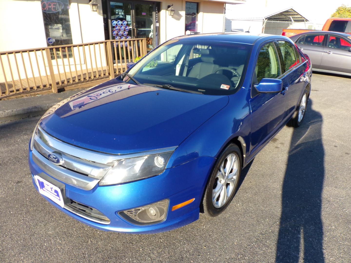 2012 Blue Ford Fusion SE (3FAHP0HAXCR) with an 2.5L L4 DOHC 16V engine, located at 5700 Curlew Drive, Norfolk, VA, 23502, (757) 455-6330, 36.841885, -76.209412 - Photo#9