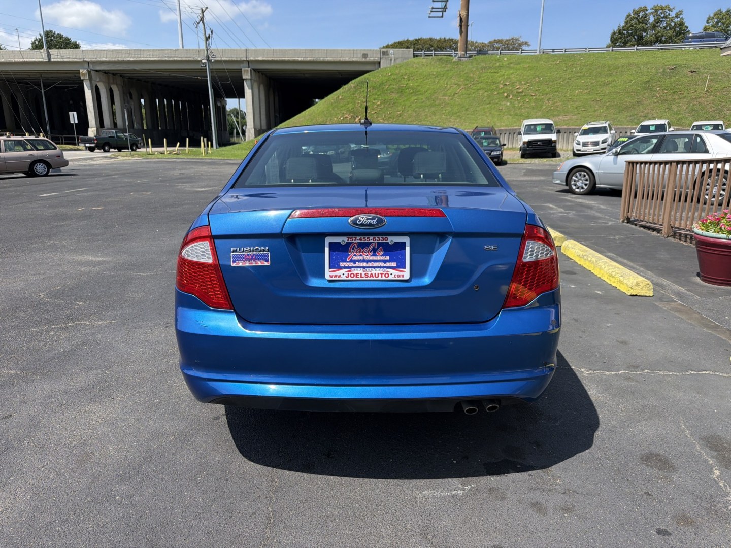2012 Blue Ford Fusion SE (3FAHP0HAXCR) with an 2.5L L4 DOHC 16V engine, located at 5700 Curlew Drive, Norfolk, VA, 23502, (757) 455-6330, 36.841885, -76.209412- Photo#2