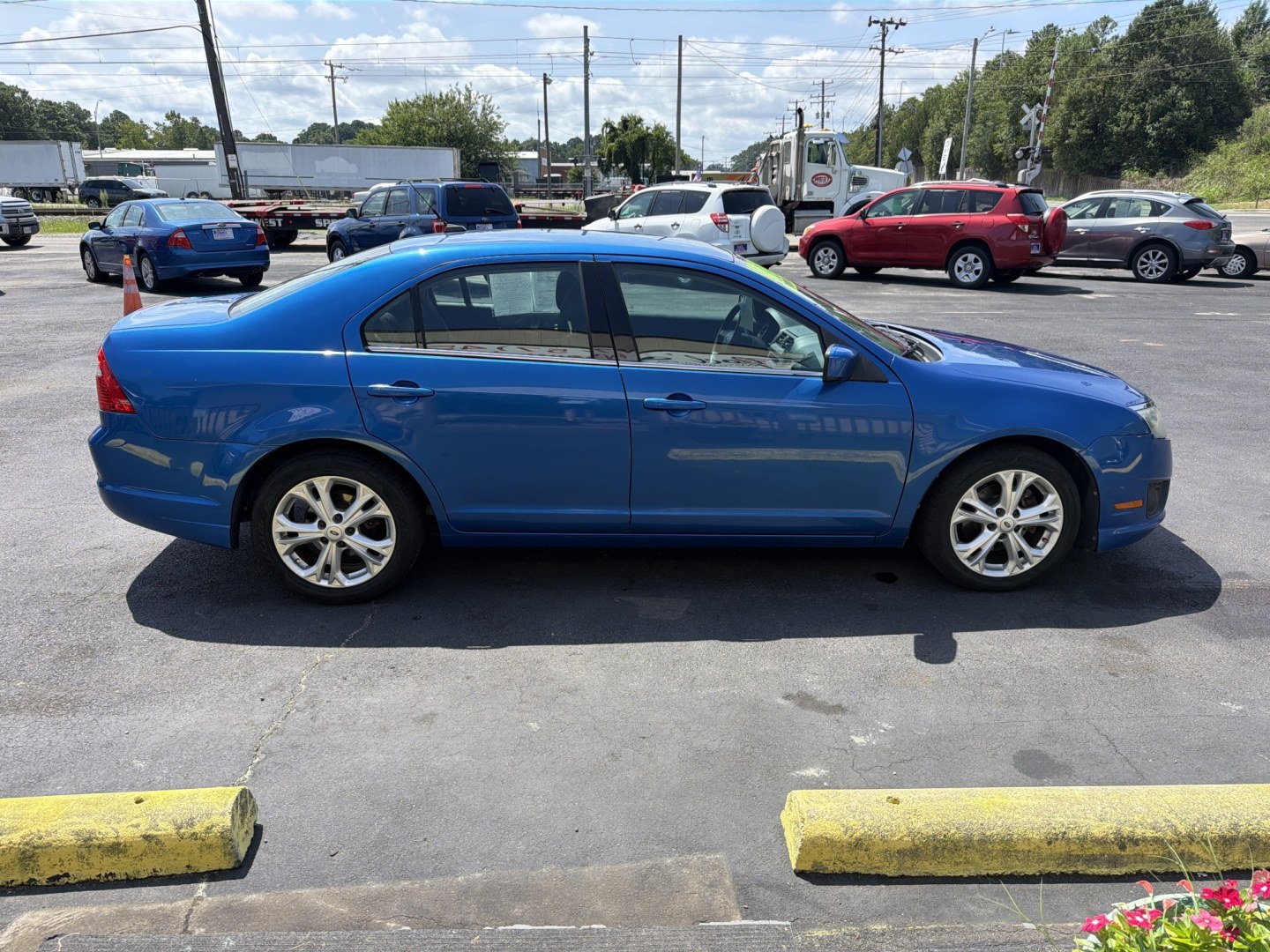 2012 Blue Ford Fusion SE (3FAHP0HAXCR) with an 2.5L L4 DOHC 16V engine, located at 5700 Curlew Drive, Norfolk, VA, 23502, (757) 455-6330, 36.841885, -76.209412- Photo#3