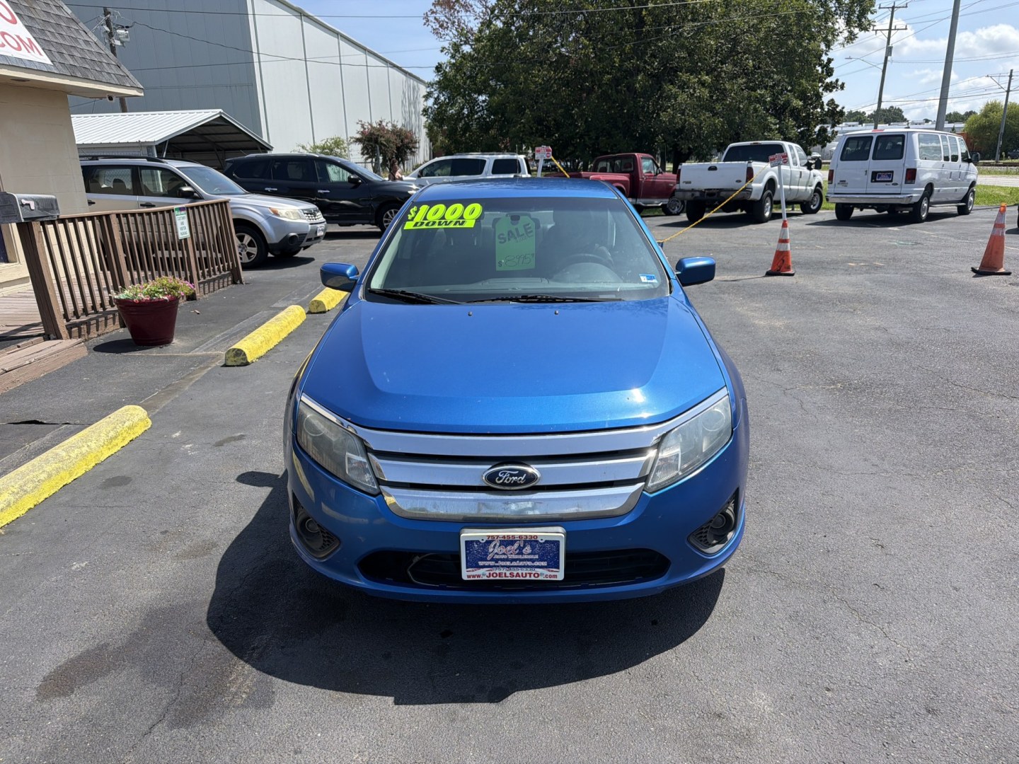 2012 Blue Ford Fusion SE (3FAHP0HAXCR) with an 2.5L L4 DOHC 16V engine, located at 5700 Curlew Drive, Norfolk, VA, 23502, (757) 455-6330, 36.841885, -76.209412- Photo#4