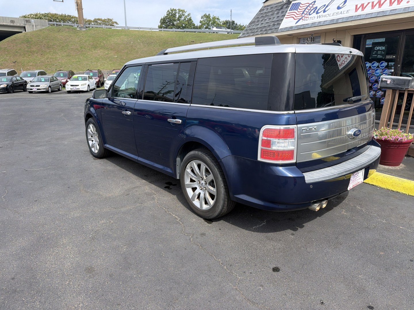 2012 Blue Ford Flex Limited FWD (2FMGK5DC9CB) with an 3.5L V6 DOHC 24V engine, 6-Speed Automatic Overdrive transmission, located at 5700 Curlew Drive, Norfolk, VA, 23502, (757) 455-6330, 36.841885, -76.209412- Photo#1