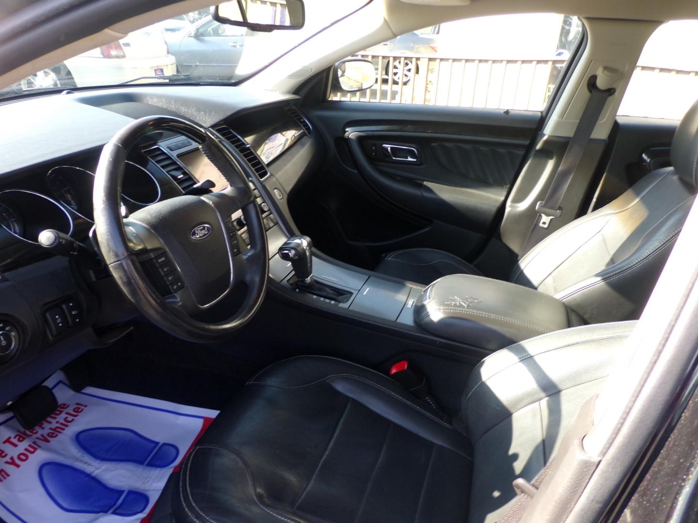 2011 Black Ford Taurus Limited FWD (1FAHP2FW0BG) with an 3.5L V6 DOHC 24V engine, 6-Speed Automatic transmission, located at 5700 Curlew Drive, Norfolk, VA, 23502, (757) 455-6330, 36.841885, -76.209412 - Photo#6