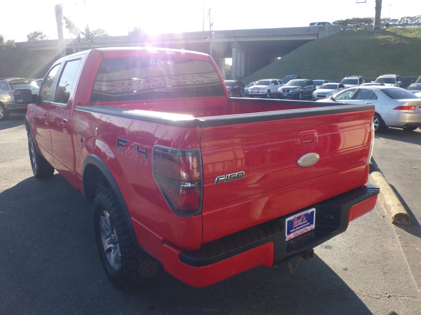 2011 Red Ford F-150 FX4 SuperCrew 5.5-ft. Bed 4WD (1FTFW1ET4BF) with an 3.5L V6 engine, 4-Speed Automatic transmission, located at 5700 Curlew Drive, Norfolk, VA, 23502, (757) 455-6330, 36.841885, -76.209412 - Photo#12