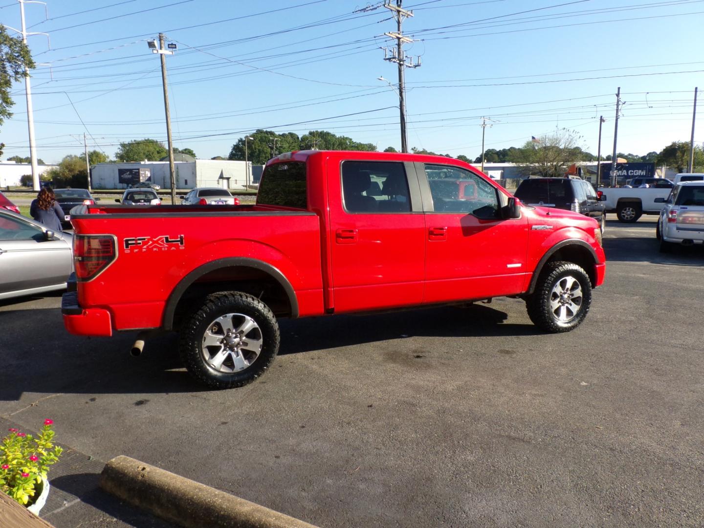 2011 Red Ford F-150 FX4 SuperCrew 5.5-ft. Bed 4WD (1FTFW1ET4BF) with an 3.5L V6 engine, 4-Speed Automatic transmission, located at 5700 Curlew Drive, Norfolk, VA, 23502, (757) 455-6330, 36.841885, -76.209412 - Photo#16