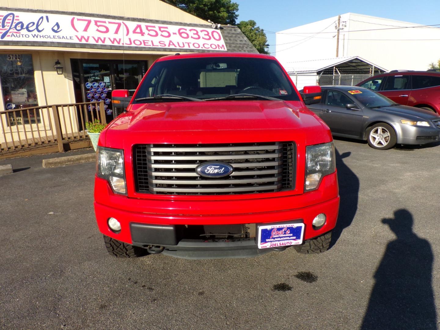 2011 Red Ford F-150 FX4 SuperCrew 5.5-ft. Bed 4WD (1FTFW1ET4BF) with an 3.5L V6 engine, 4-Speed Automatic transmission, located at 5700 Curlew Drive, Norfolk, VA, 23502, (757) 455-6330, 36.841885, -76.209412 - Photo#3