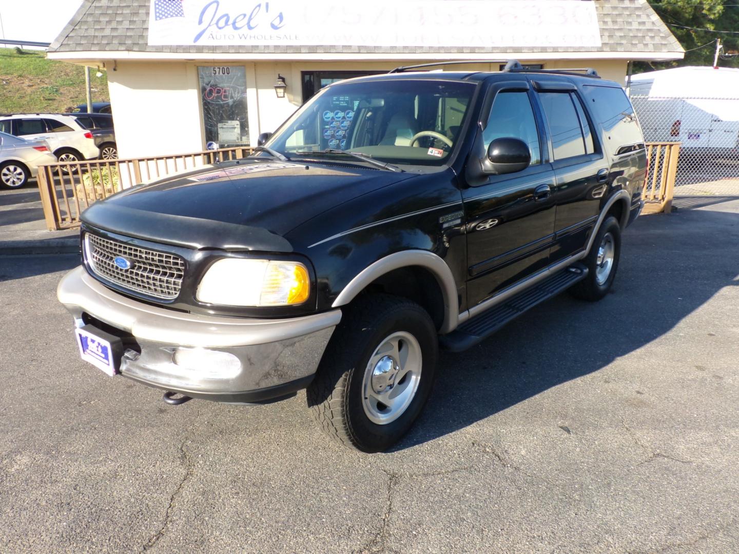 1997 Black Ford Expedition Eddie Bauer 4WD (1FMFU18L3VL) with an 5.4L V8 SOHC 16V engine, 4-Speed Automatic Overdrive transmission, located at 5700 Curlew Drive, Norfolk, VA, 23502, (757) 455-6330, 36.841885, -76.209412 - Photo#0