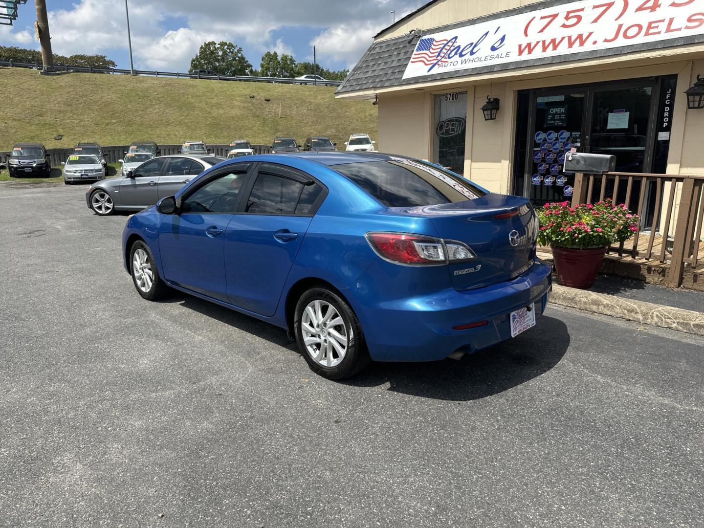 2012 Blue Mazda MAZDA3 (JM1BL1V7XC1) , located at 5700 Curlew Drive, Norfolk, VA, 23502, (757) 455-6330, 36.841885, -76.209412 - Photo#1